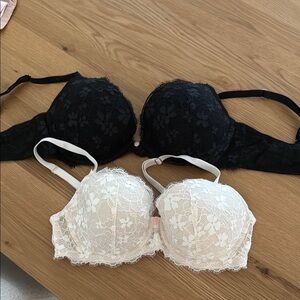 Victoria Secret Black and one white lace size 34D.
